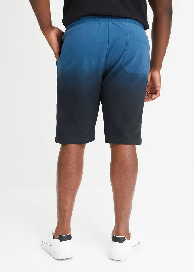 Bermudas de chándal con degradado de color Petróleo azul/negro estampado