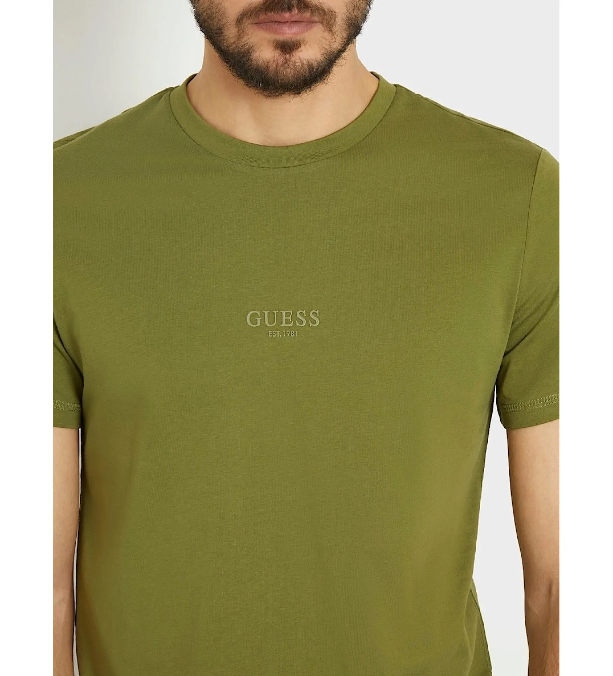 Camiseta con logotipo pequeño verde