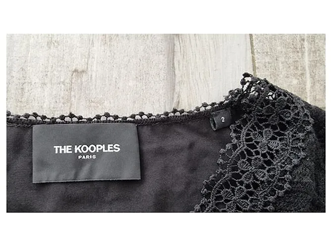 El vestido largo de encaje negro de The Kooples 