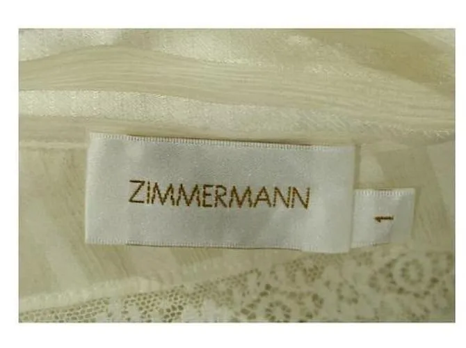 Top de encaje color crema de Zimmermann Crudo 